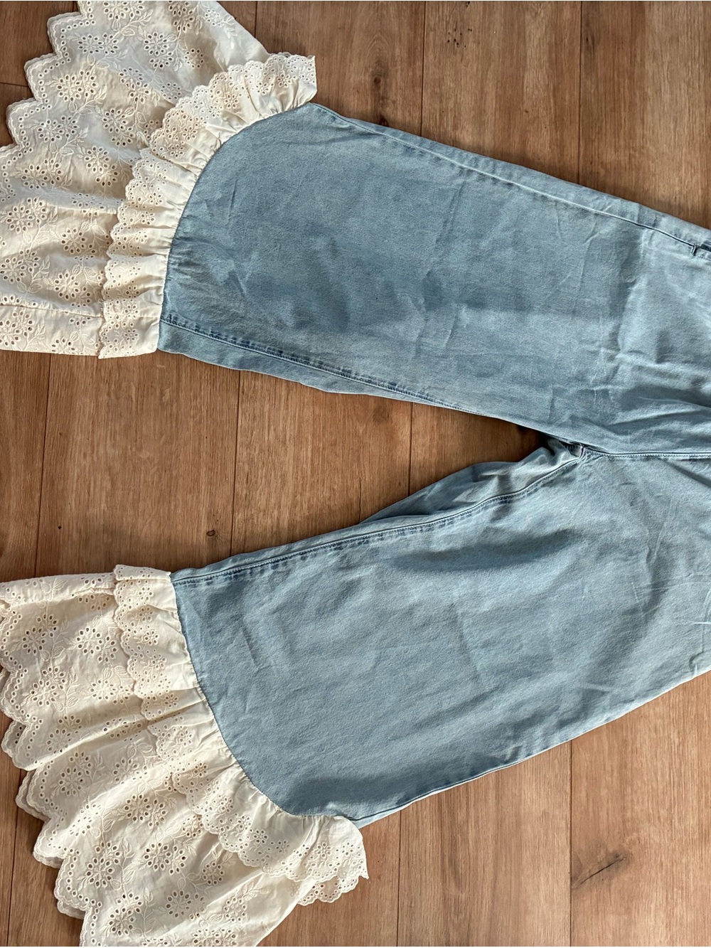 Anthropologie brand BiBi Blue Women’s Jeans with Cotton Cream Eyelet Ruffle Hem
